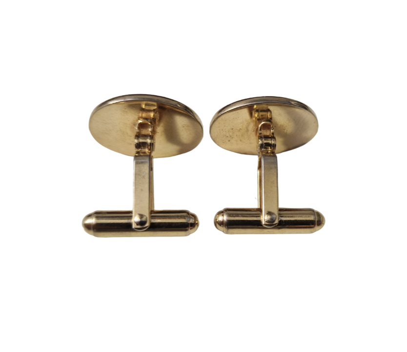 GIVENCHY. GOLDEN CUFFLINKS.