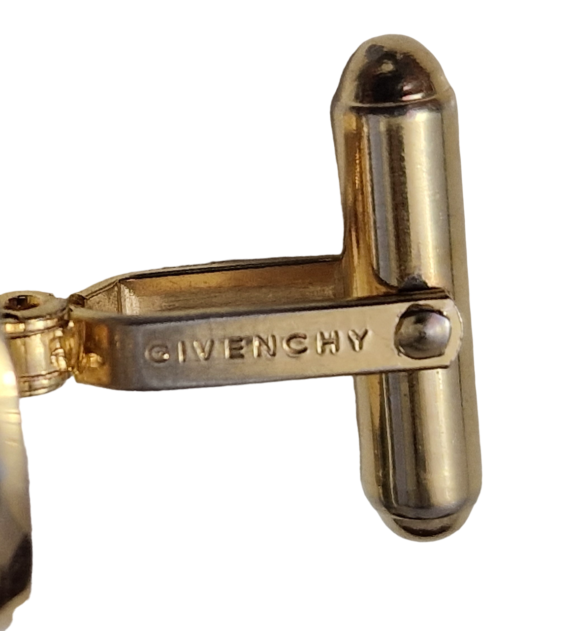 GIVENCHY. GOLDEN CUFFLINKS.