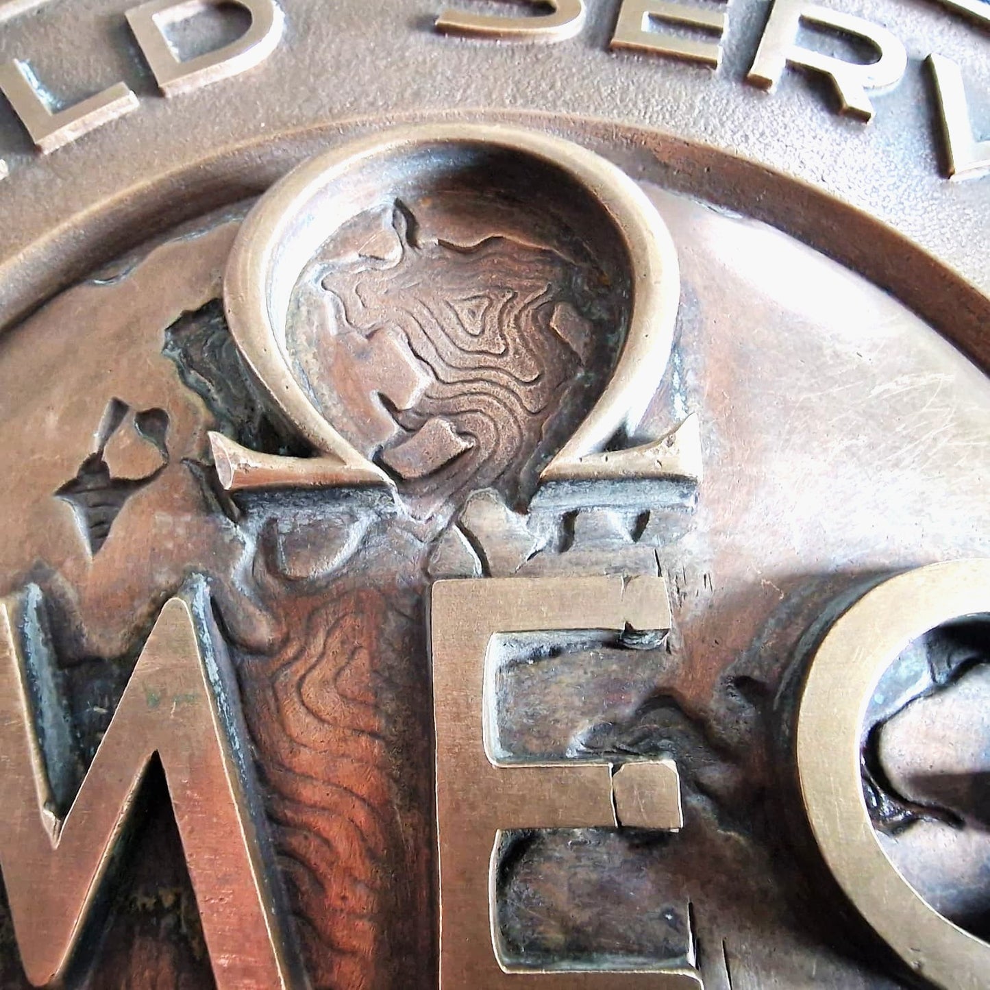 OMEGA . LETRERO BRONCE CONCESIONARIO