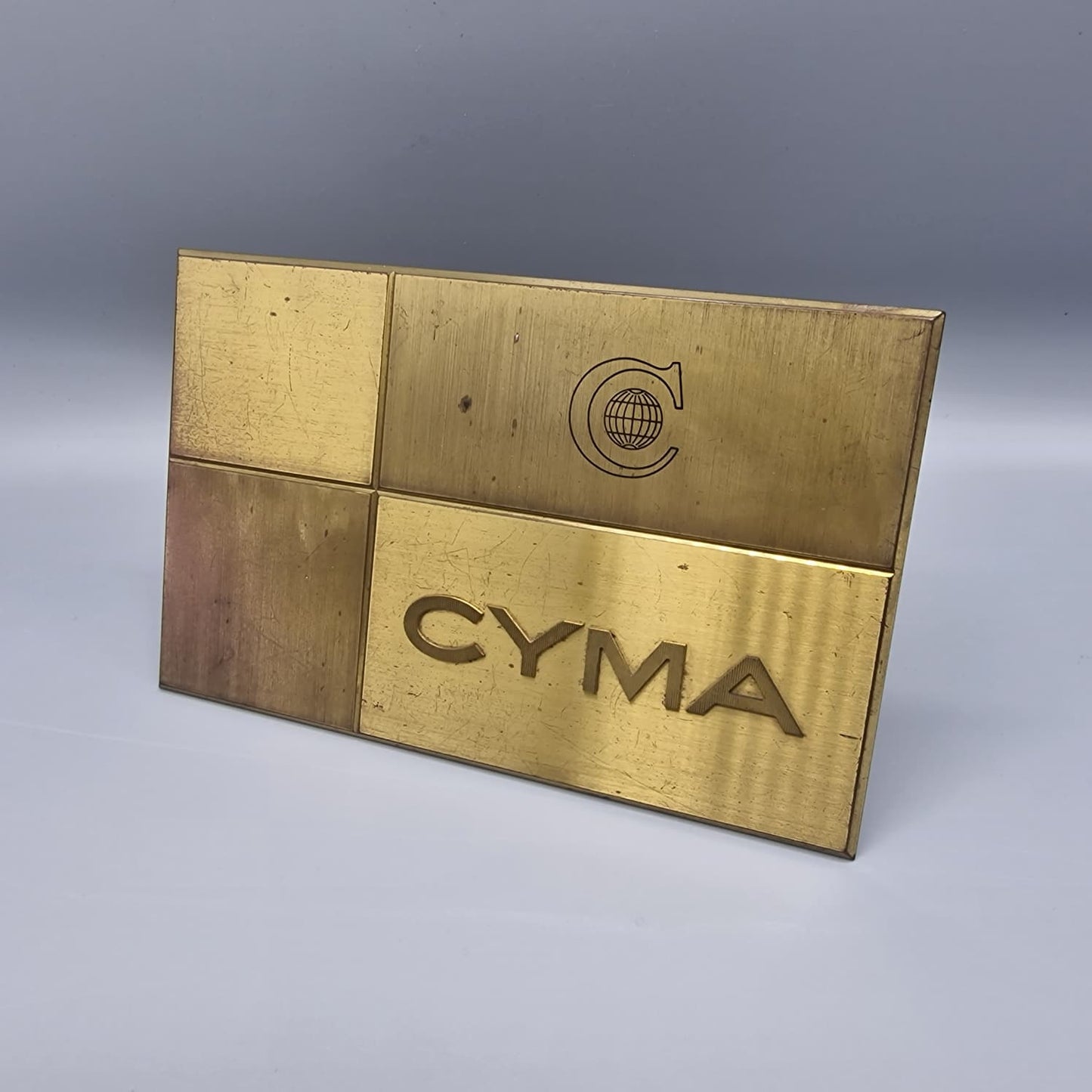 DISPLAY CYMA LATÓN