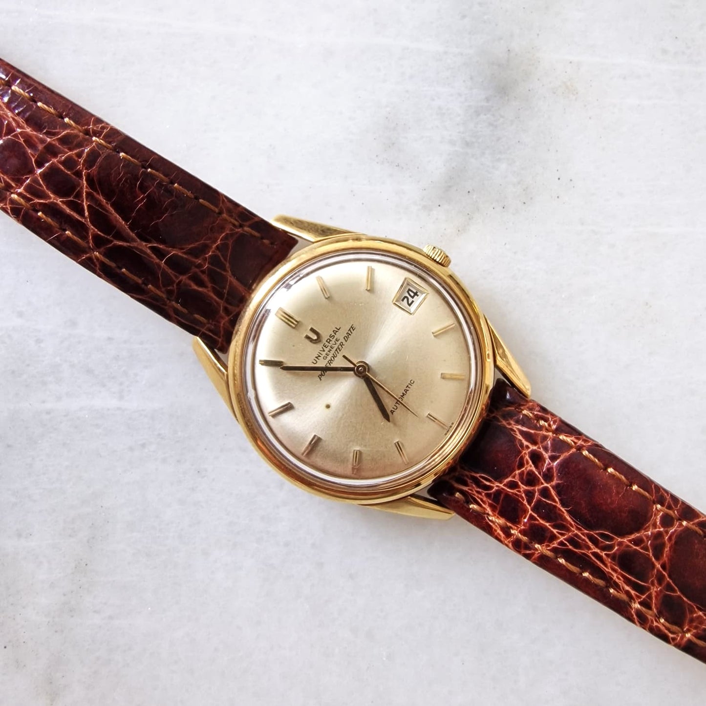UNIVERSAL GENEVE POLEROUTER DATE ORO 18K