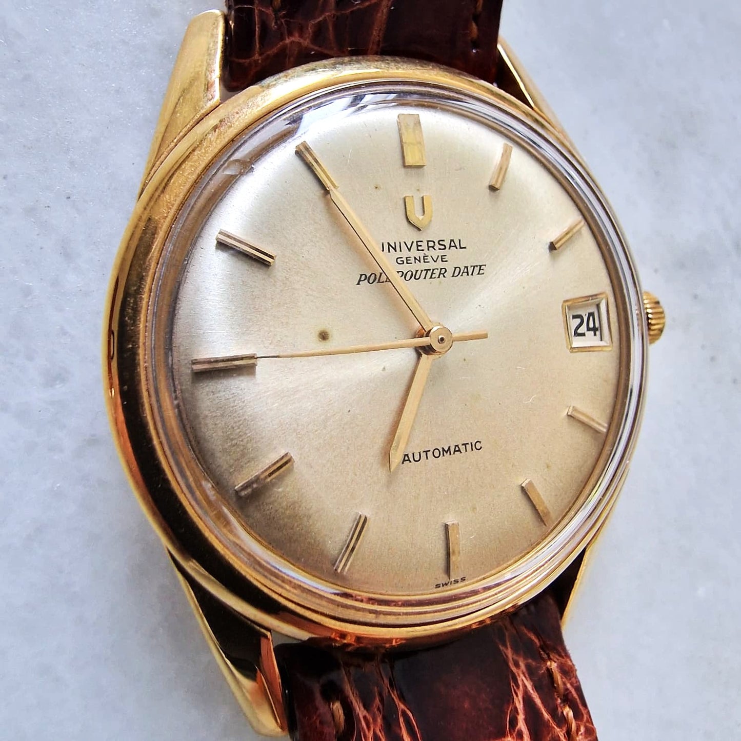 UNIVERSAL GENEVE POLEROUTER DATE ORO 18K